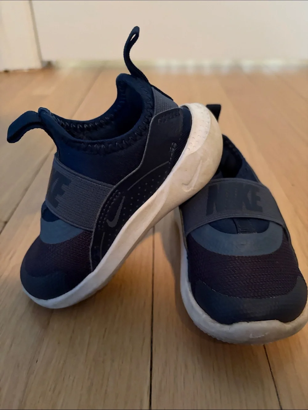 Nike Kids Navy and White Slip-On Sneakers